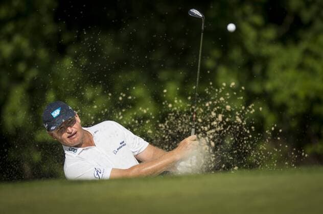 South African golfer Ernie Els plays out of the greenside bunker on the 14th hole at Congressional CC during the final round of the Quicken Loans National golf tournament in Bethesda, Maryland on Sunday, June 36, 2016. Billy Hurley III, of Annapolis Maryland, shot a 2-under 69 on Sunday for his first tournament win.  WAP201606260504 PETExMAROVICH