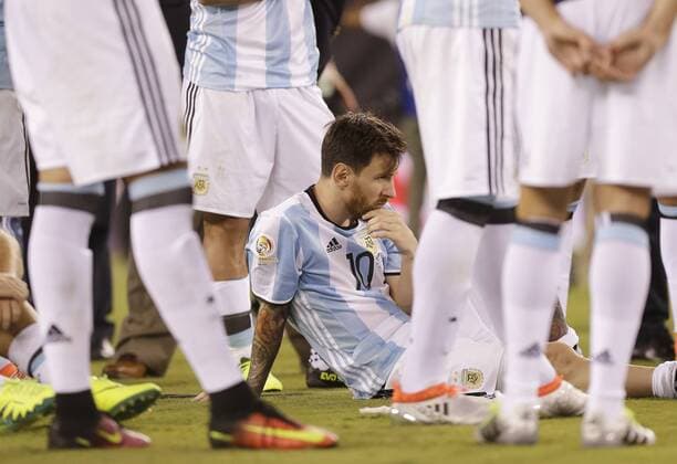 Argentina Lionel Messi sits on the field for the trophy ceremony after the game against Chile at the Copa America Centenario USA 2016 Finals at MetLife Stadium in East Rutherford, New Jersey on June 26, 2016. Chile defeated Argentina 4-2 in penalty kicks and won there second consecutive Copa America.  NYP20160626110 JOHNxANGELILLO