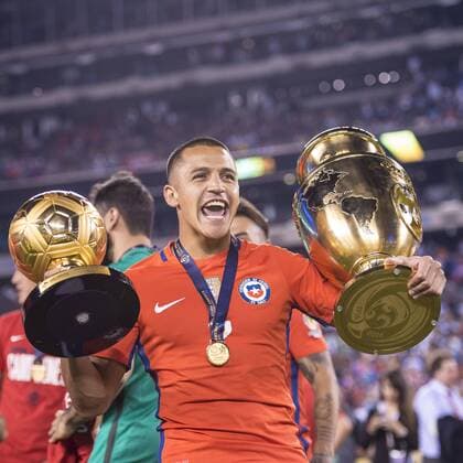 East Rutherford, New Jersey, U.S - Chile forward ALEXIS SANCHEZ (7) celebrates winning the tournament MVP award and the Copa America trophy at the Copa America Centenario 2016 Final at MetLife Stadium in East Rutherford, NJ Soccer 2016 - Copa America Centenario Final Chile defeats Argentina 0-0 (4-2) Penalty Shoot out. - ZUMAs192