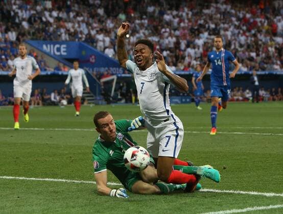 Raheem Sterling of England brought down to earn a penalty by Hannes Halldorsson of Iceland during the Euro 2016 UEFA European Championship EM, Nationalteam, Europameisterschaft match at the Stadium Nice, Nice. Picture date June 27th, 2016 Pic Phil Oldham Sportimage EDITORIAL USE ONLY. No use with unauthorised audio, video, data, fixture lists, club league logos or live services. Online in-match use limited to 120 images, no video emulation. No use in betting, games or single club league player publications.