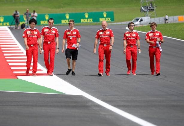 FORMULA 1 - GP of Austria 2016 SPIELBERG,AUSTRIA,30.JUN.16 - MOTORSPORTS, FORMULA 1 - Grand Prix of Austria, Red Bull Ring, preview. Image shows Sebastian Vettel (GER Scuderia Ferrari 3rd from left) with team members. GEPAxpictures xChristianxWalgram