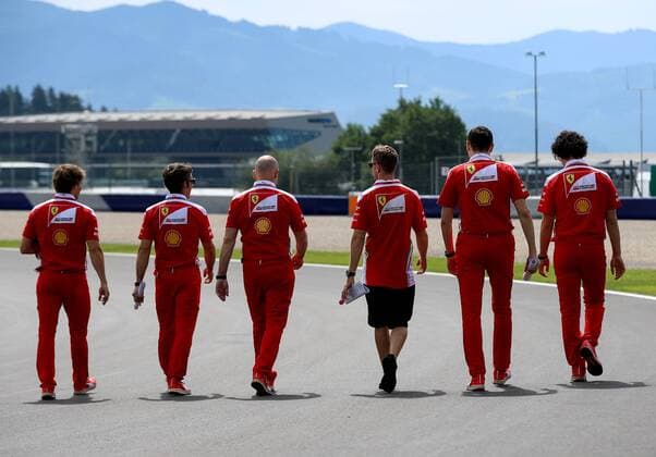 FORMULA 1 - GP of Austria 2016 SPIELBERG,AUSTRIA,30.JUN.16 - MOTORSPORTS, FORMULA 1 - Grand Prix of Austria, Red Bull Ring, preview. Image shows Sebastian Vettel (GER Scuderia Ferrari 3rd from right) with team members. GEPAxpictures xChristianxWalgram
