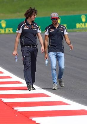 FORMULA 1 - GP of Austria 2016 SPIELBERG,AUSTRIA,30.JUN.16 - MOTORSPORTS, FORMULA 1 - Grand Prix of Austria, Red Bull Ring, preview. Image shows Carlos Sainz Jr. (ESP Scuderia Toro Rosso right) with a team member. GEPAxpictures xChristianxWalgram