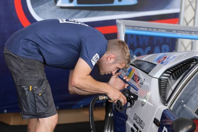FORMULA 1 - GP of Austria 2016 SPIELBERG,AUSTRIA,30.JUN.16 - MOTORSPORTS, FORMULA 1 - Grand Prix of Austria, Red Bull Ring, preview. Image shows the worker and a old BMW M1 Procar. GEPAxpictures xMaticxKlansek