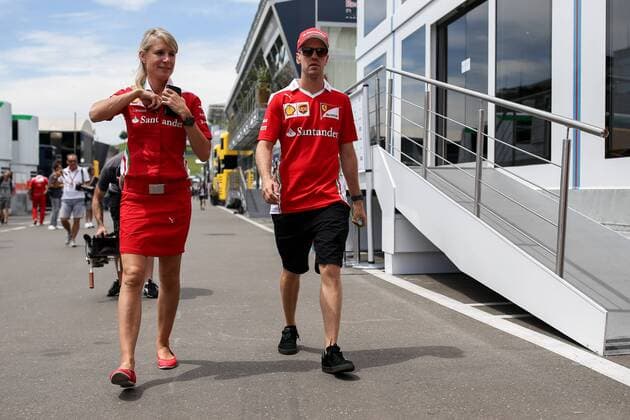 FORMULA 1 - GP of Austria 2016 SPIELBERG,AUSTRIA,30.JUN.16 - MOTORSPORTS, FORMULA 1 - Grand Prix of Austria, Red Bull Ring, preview. Image shows Britta Roeske and Sebastian Vettel (GER Ferrari). GEPAxpictures xDanielxGoetzhaber