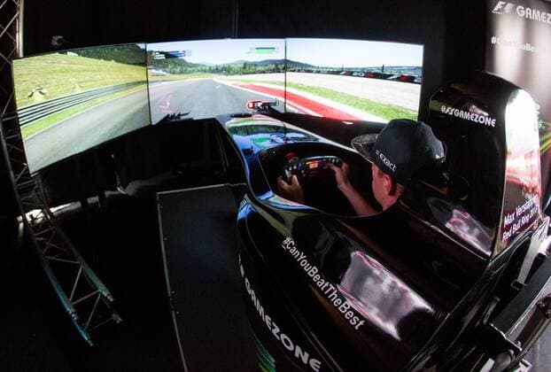 FORMULA 1 - GP of Austria 2016 SPIELBERG,AUSTRIA,30.JUN.16 - MOTORSPORTS, FORMULA 1 - Grand Prix of Austria, Red Bull Ring, preview. Image shows Max Verstappen (NED Red Bull) playing on simulator at Gamezone. GEPAxpictures xMaticxKlansek