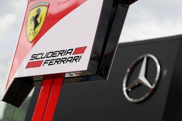 Formel 1, GP von Österreich in Spielberg FORMULA 1 - GP of Austria 2016 SPIELBERG,AUSTRIA,30.JUN.16 - MOTORSPORTS, FORMULA 1 - Grand Prix of Austria, Red Bull Ring, preview. Image shows a feature with a Ferrari and a Mercedes sign. GEPAxpictures xChristianxWalgram