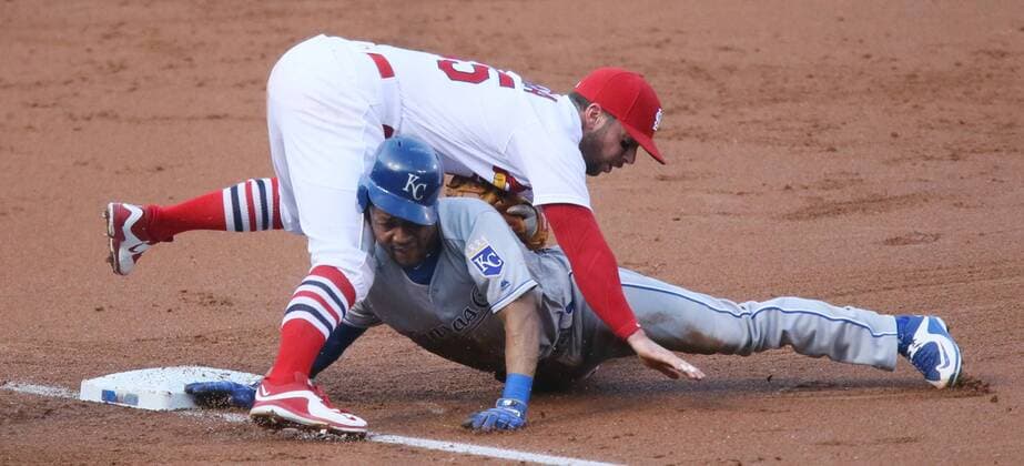June 30, 2016 - St Louis, MO, USA - The Kansas City Royals Jarrod Dyson collides with St. Louis Cardinals shortstop Greg Garcia, top, as he is tagged out trying to stretch an RBI-double into a triple in the second inning on Thursday, June 30, 2016, at Busch Stadium in St. Louis. The Royals won, 4-2. Kansas City Royals at St. Louis Cardinals - ZUMAm67_