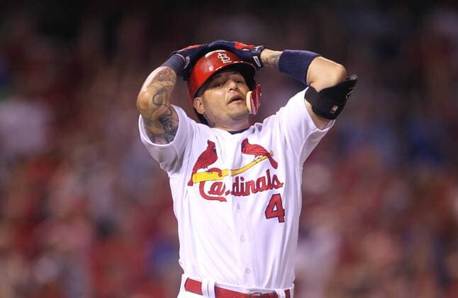 St. Louis Cardinals Yadier Molina grabs his helmet after lining out with a man on to end the game against the Kansas City Royals at Busch Stadium in St. Louis on June 30, 2016. Kansas City won the game 4-2.  SLP2016063010 BILLxGREENBLATT