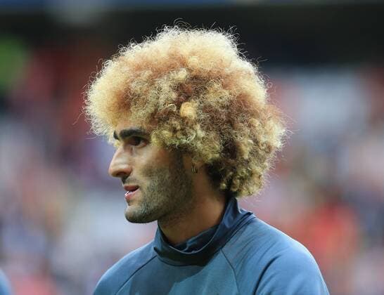 Marouane Fellaini of Belgium with blond dyed hair during the UEFA European Championship EM Europameisterschaft 2016 match at the Stadium Pierre Mauroy, Lille. Picture date July 01, 2016 Pic DavidxKlein Sportimage Wales vs Belgien Länderspiel Nationalteam EM EURO EDITORIAL USE ONLY. No use with unauthorised audio, video, data, fixture lists, club league logos or live services. Online in-match use limited to 120 images, no video emulation. No use in betting, games or single club league player publications.