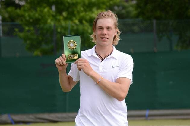 July 1, 2016 - London, England - DENIS SHAPOVALOV of Canada poses with his trophy after winning the Nike Junior International Roehampton tennis tournament. Tennis 2016 - Nike Junior International Roehampton - Day 6 - ZUMAl132