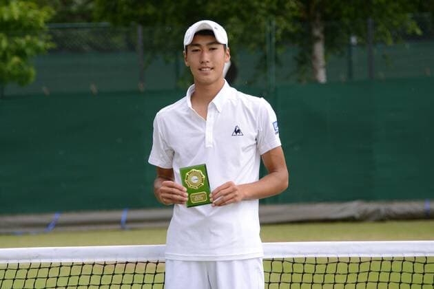 July 1, 2016 - London, England - YOSUKE WATANUKI of Japan poses with his trophy after the final of the Nike Junior International Roehampton tennis tournament. Tennis 2016 - Nike Junior International Roehampton - Day 6 - ZUMAl132