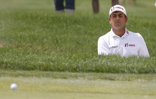 July 1, 2016 - Akron, OH, USA - Anirban Lahiri watches his ball roll on the green toward 10th hole after hitting it out of the bunker during the second round of the Bridgestone Invitational at Firestone Country Club Friday, July 1, 2016, in Akron, Ohio. Bridgestone Invitational - ZUMAm67_
