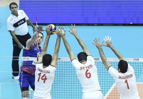 TEHRAN, Marko Ivovic (L) of Serbia spikes the ball during the match against Iran at FIVB Men s Volleyball World League 2016 at Azadi Stadium in Tehran, Iran, on July 1, 2016. Iran won 3-2. ) (SP)IRAN-TEHRAN-VOLLEYBALL-WORLD LEAGUE-IRAN VS SREBIA AhmadxHalabisaz 