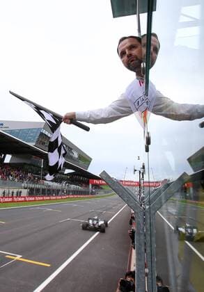 FORMULA 1 - GP of Austria 2016 SPIELBERG,AUSTRIA,03.JUL.16 - MOTORSPORTS, FORMULA 1 - Grand Prix of Austria, Red Bull Ring. Image shows the flagman and Lewis Hamilton (GBR Mercedes GP). GEPAxpictures xChristianxWalgram