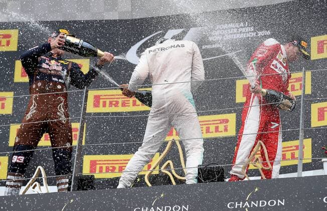 FORMULA 1 - GP of Austria 2016 SPIELBERG,AUSTRIA,03.JUL.16 - MOTORSPORTS, FORMULA 1 - Grand Prix of Austria, Red Bull Ring. Image shows the rejoicing of Max Verstappen (NED Red Bull Racing), Lewis Hamilton (GBR Mercedes GP) and Kimi Raeikkoenen (FIN Ferrari). Keywords: champagne. GEPAxpictures xChristianxWalgram