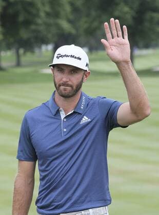 July 3, 2016 - Akron, OH, USA - Dustin Johnson acknowledges applause after winning the Bridgestone Invitational golf tournament by a single stroke on Sunday, July 3, 2016, at Firestone Country Club in Akron, Ohio. Bridgestone Invitational - ZUMAm67_
