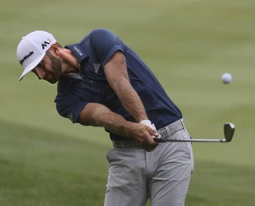 July 3, 2016 - Akron, OH, USA - Dustin Johnson hits from the rough on the 17th hole on the final day of the Bridgestone Invitational golf tournament on Sunday, July 3, 2016, at Firestone Country Club in Akron, Ohio. Johnson won the tournament by one stroke. Bridgestone Invitational - ZUMAm67_