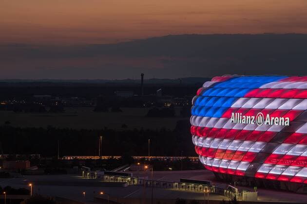 MUNICH, GERMANY - JULY 04: The Allianz Arena is illuminated with the flag of the United States of America to celebrate the Independance Day on July 4, 2016 in Munich, Germany.