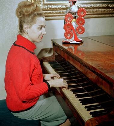 One of CzechoSaovakia s most famous SaortSaomen Vera Caslavska plays the piano in Prague, Czech Republic, 1964. She won three gold medals at the Tokyo Olympics in 1964. (CTKxPhoto AlexandrxHampl) CTKPhotoFO00233833 