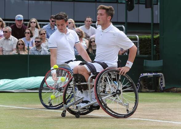 Tennis - 2016 Wimbledon Championships - Week Two, (Day Thirteen) Mens doubles Wheelchair Final Stephane Houdet (FRA) and Nicolas Peifer (FRA) v Alfie Hewett (GBR) and Gordon Reid (GBR) Alfie Hewett and Gordon Reid on court 17 COLORSPORT ANDREW COWIE 