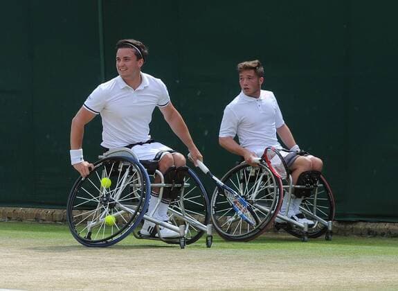 Tennis - 2016 Wimbledon Championships - Week Two, (Day Thirteen) Mens doubles Wheelchair Final Stephane Houdet (FRA) and Nicolas Peifer (FRA) v Alfie Hewett (GBR) and Gordon Reid (GBR) Alfie Hewett and Gordon Reid on court 17 COLORSPORT ANDREW COWIE 
