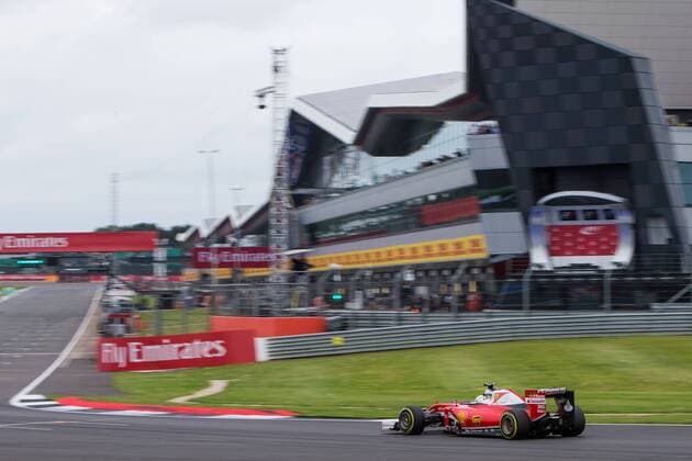 09.07.2016. Silverstone, Northants, England. Formula One British Grand Prix Qualifying. Scuderia Ferrari driver Sebastian Vettel speeds past the Silverstone Wing. xTimxWilliamsx  ActionPlus11759979