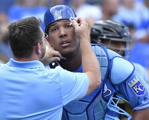 July 9, 2016 - Kansas City, MO, USA - Kansas City Royals catcher Salvador Perez has his eye flushed out to remove debris in the fourth inning against the Seattle Mariners on Saturday, July 9, 2016, at Kauffman Stadium in Kansas City, Mo. Seattle at Kansas City - ZUMAm67_