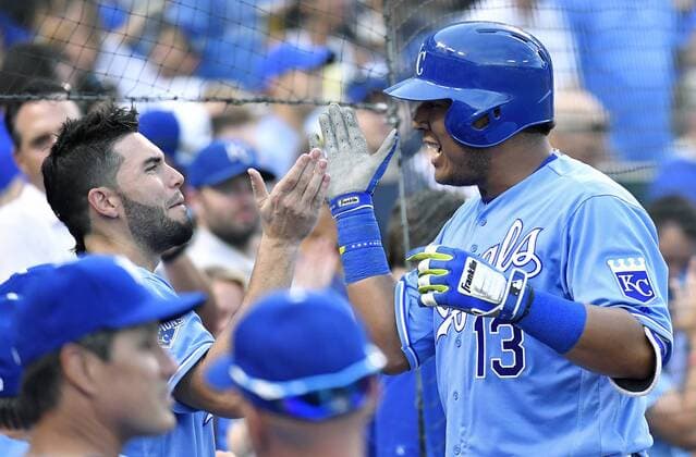 July 9, 2016 - Kansas City, MO, USA - The Kansas City Royals Salvador Perez is congratulated by Eric Hosmer after Perez hit a solo home run in the seventh inning against the Seattle Mariners on Saturday, July 9, 2016, at Kauffman Stadium in Kansas City, Mo. The Royals won, 5-3. Seattle at Kansas City - ZUMAm67_