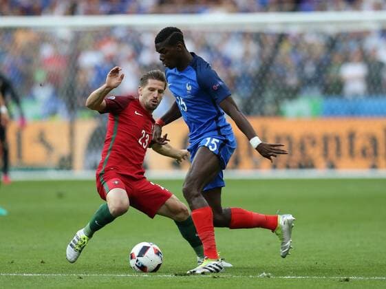 Fußball, EM Finale 2016 in Paris, Portugal - Frankreich 1:0 Paul Pogba of France tackled by Adrien Silva of Portugal during the UEFA European Championship EM Europameisterschaft 2016 final match at the Stade de France, Paris. Picture date July 10th, 2016 Pic David Klein Sportimage EDITORIAL USE ONLY. No use with unauthorised audio, video, data, fixture lists, club league logos or live services. Online in-match use limited to 120 images, no video emulation. No use in betting, games or single club league player publications.