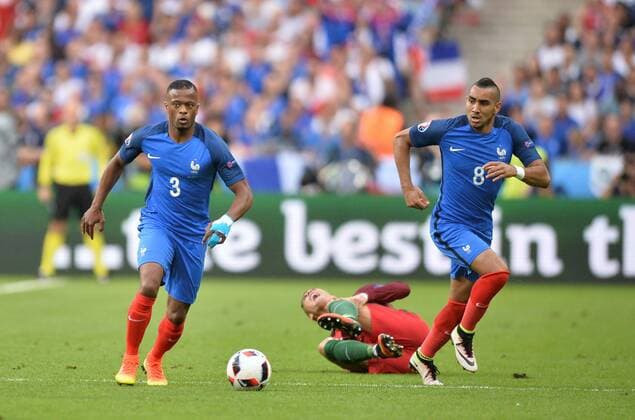 Patrice Evra (fra) - Cristiano Ronaldo (por) - Dimitri Payet (fra) FOOTBALL : Portugal vs France - UEFA EURO EM Europameisterschaft Fussball Nationalteam 2016 - Finale - 10 07 2016 AnthonyBIBARD FEP Panoramic 