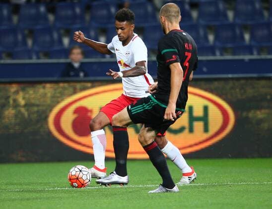 SOCCER - CL quali, RBS vs Liepaja SALZBURG,AUSTRIA,12.JUL.16 - SOCCER - UEFA Champions League, qualification, Red Bull Salzburg vs FK Liepaja. Image shows Valentino Lazaro (RBS) and Oskars Klava (Liepaja). GEPAxpictures xFelixxRoittner