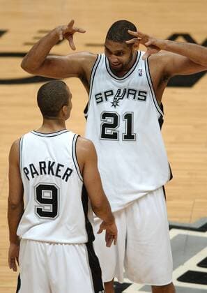 May 8, 2005 - San Antonio, TX, UNITED STATES - FOR SPORTS - Spurs Tim Duncan celebrates with Tony Parker during second quarter action of the first game of NBA Basketball Herren USA Western Conference Semifinal at the SBC Center Sunday May 8, 2005 in San Antonio, Tx. PHOTO BY EDWARD A. ORNELAS STAFF Texas News - May 8, 2005 - ZUMAa27_