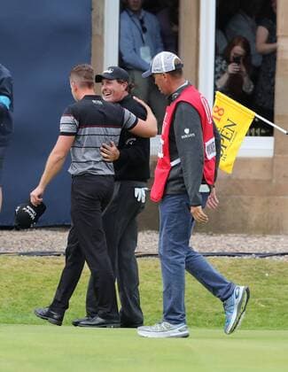 Henrik Stenson (SWE), JULY 17, 2016 - Golf : Henrik Stenson of Sweden walks off the 18th hole with Phil Mickelson of the United States after winning the 145th British Open Championship at the Old Course, Royal Troon Golf Club in South Ayrshire, Scotland.  (waha018840)