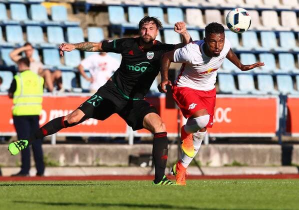 SOCCER - CL quali, Liepaja vs RBS LIEPAJA,LATVIA,19.JUL.16 - SOCCER - UEFA Champions League, qualification, FK Liepaja vs Red Bull Salzburg. Image shows Kristaps Grebis (Liepaja) and Paulo Miranda (RBS). GEPAxpictures xFelixxRoittner