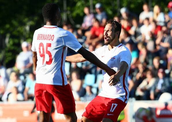 SOCCER - CL quali, Liepaja vs RBS LIEPAJA,LATVIA,19.JUL.16 - SOCCER - UEFA Champions League, qualification, FK Liepaja vs Red Bull Salzburg. Image shows the rejoicing of Bernardo Fernandes da Silva Junior and Andreas Ulmer (RBS). GEPAxpictures xFelixxRoittner