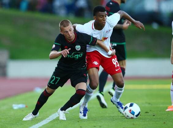 SOCCER - CL quali, Liepaja vs RBS LIEPAJA,LATVIA,19.JUL.16 - SOCCER - UEFA Champions League, qualification, FK Liepaja vs Red Bull Salzburg. Image shows Romans Mickevics (Liepaja) and Bernardo Fernandes da Silva Junior (RBS). GEPAxpictures xFelixxRoittner