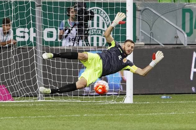 BUDAPEST, HUNGARY - JULY 20: Goalkeeper Alban Hoxha of FK Partizani can t save a penalty shot during the UEFA Champions League Qualifying Round match between Ferencvarosi TC and FK Partizani at Groupama Arena on July 20, 2016 in Budapest, Hungary. LaszloxSzirtesi 