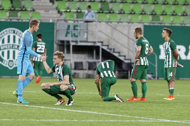 BUDAPEST, HUNGARY - JULY 20: The teammates of Ferencvarosi TC after the lost penalty shootout - from left to right Denes Dibusz, Oliver Husing, Stanislav Sestak, Gergo Lovrencsics, Dominik Nagy - are disappointed during the UEFA Champions League Qualifying Round match between Ferencvarosi TC and FK Partizani at Groupama Arena on July 20, 2016 in Budapest, Hungary. LaszloxSzirtesi 