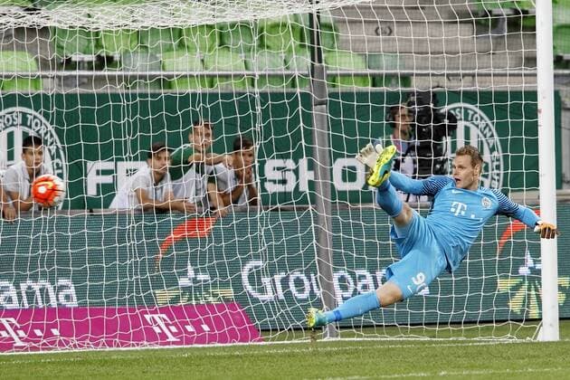 BUDAPEST, HUNGARY - JULY 20: Goalkeeper Denes Dibusz of Ferencvarosi TC can t save a penalty shot during the UEFA Champions League Qualifying Round match between Ferencvarosi TC and FK Partizani at Groupama Arena on July 20, 2016 in Budapest, Hungary. LaszloxSzirtesi 