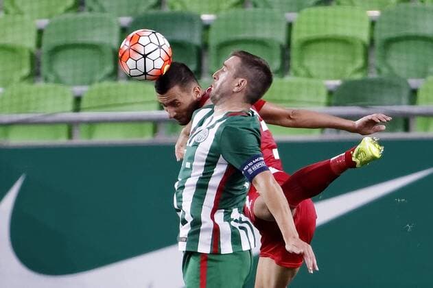 BUDAPEST, HUNGARY - JULY 20: Daniel Bode (R) of Ferencvarosi TC battles for the ball in the air with Renato Arapi (L) of FK Partizani during the UEFA Champions League Qualifying Round match between Ferencvarosi TC and FK Partizani at Groupama Arena on July 20, 2016 in Budapest, Hungary. LaszloxSzirtesi 