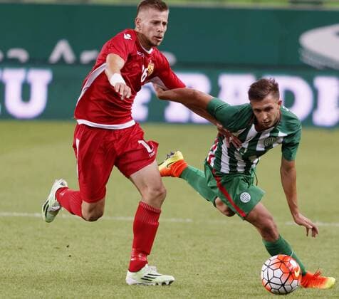 BUDAPEST, HUNGARY - JULY 20: Dominik Nagy (R) of Ferencvarosi TC duels for the ball with Ylber Ramadani 16 of FK Partizani during the UEFA Champions League Qualifying Round match between Ferencvarosi TC and FK Partizani at Groupama Arena on July 20, 2016 in Budapest, Hungary. LaszloxSzirtesi 