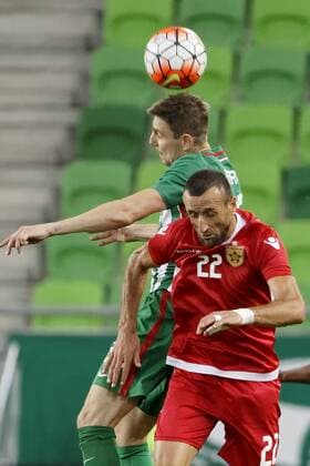 BUDAPEST, HUNGARY - JULY 20: Zoltan Gera (L) of Ferencvarosi TC battles for the ball in the air with Labinot Ibrahimi 22 of FK Partizani during the UEFA Champions League Qualifying Round match between Ferencvarosi TC and FK Partizani at Groupama Arena on July 20, 2016 in Budapest, Hungary. LaszloxSzirtesi 