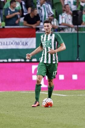 BUDAPEST, HUNGARY - JULY 20: Adam Pinter of Ferencvarosi TC controls the ball during the UEFA Champions League Qualifying Round match between Ferencvarosi TC and FK Partizani at Groupama Arena on July 20, 2016 in Budapest, Hungary. LaszloxSzirtesi 