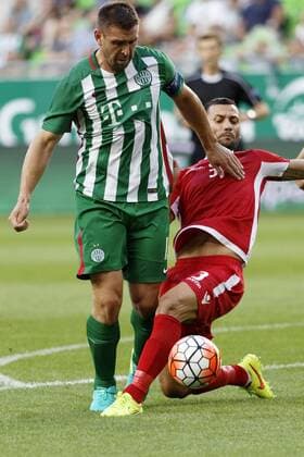 BUDAPEST, HUNGARY - JULY 20: Renato Arapi (R) of FK Partizani slide tackles Daniel Bode (L) of Ferencvarosi TC during the UEFA Champions League Qualifying Round match between Ferencvarosi TC and FK Partizani at Groupama Arena on July 20, 2016 in Budapest, Hungary. LaszloxSzirtesi 
