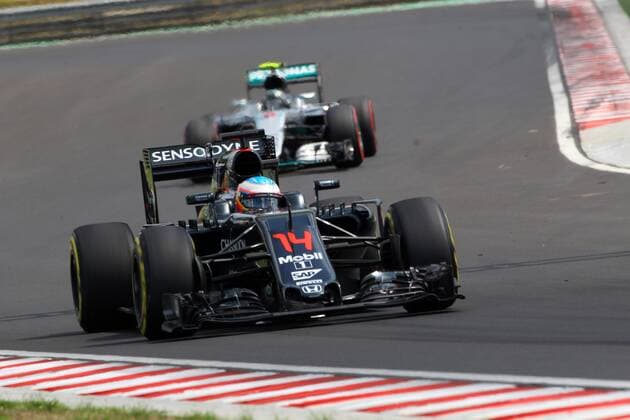 Hungarian Grand Prix, Hungaroring, Budapest 21 - 24 July 2016 22.07.2016 - Free Practice 2, Fernando Alonso (ESP) McLaren Honda MP4-31 leads Nico Rosberg (GER) Mercedes AMG F1 W07 Hybrid 