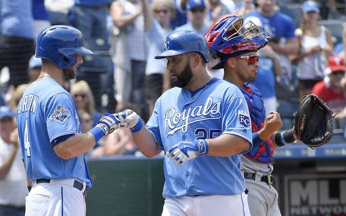 July 24, 2016 - Kansas City, MO, USA - Kansas City Royals Kendrys Morales is congratulated by Alex Gordon in front of Texas Rangers catcher Robinson Chirinos after Morales hit a solo home run in the fourth inning Sunday, July 24, 2016 at Kauffman Stadium in Kansas City, Mo. Royals fall to Rangers after Soria stumbles again - ZUMAm67_