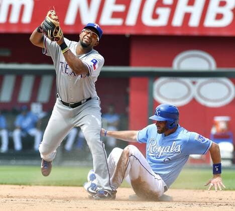 July 24, 2016 - Kansas City, MO, USA - Texas Rangers shortstop Elvis Andrus forces out Kansas City Royals Drew Butera at second on a bunt by Jarrod Dyson in the fifth inning Sunday, July 24, 2016 at Kauffman Stadium in Kansas City, Mo. Royals fall to Rangers after Soria stumbles again - ZUMAm67_