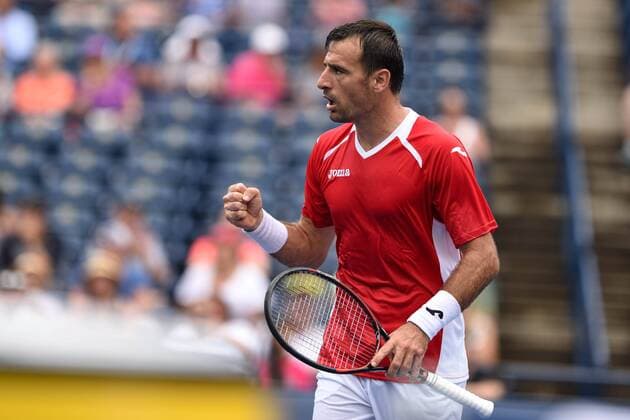 July 25, 2016: Ivan Dodig of Croatia reacts after winning the first set against Borna Coric of Croatia during their first round match of the Rogers Cup tournament at the Aviva Centre in Toronto, Ontario, Canada on July 25, 2016. Cal Media TENNIS 2016 - Rogers Cup Toronto July 25 - ZUMAc04_