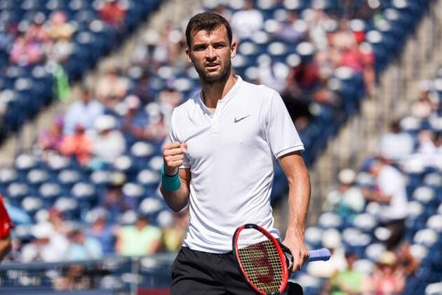 July 25, 2016: Grigor Dimitrov of Bulgaria reacts after winning the second set against Yuichi Sugita of Japan during their first round match of the Rogers Cup tournament at the Aviva Centre in Toronto, Ontario, Canada on July 25, 2016. Cal Media TENNIS 2016 - Rogers Cup Toronto July 25 - ZUMAc04_
